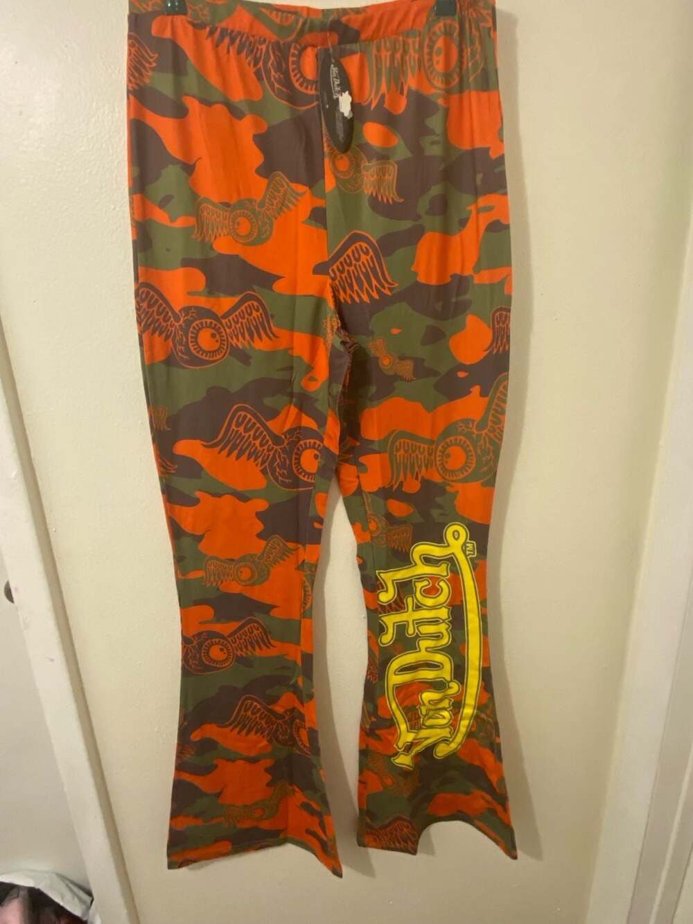 Von Dutch Embroidered Camouflage Flare Pants in Orange and Olive